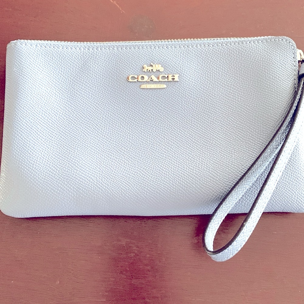 Coach Corner Zip Periwinkle Wristlet. Offers Welcomed